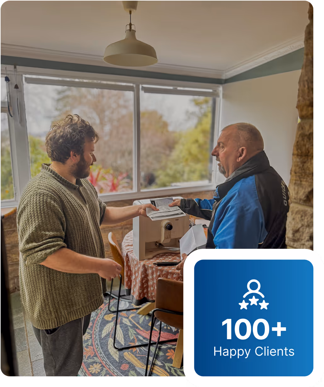 Local Emu Plains plumber discussing plumbing quote with a homeowner at their property.
