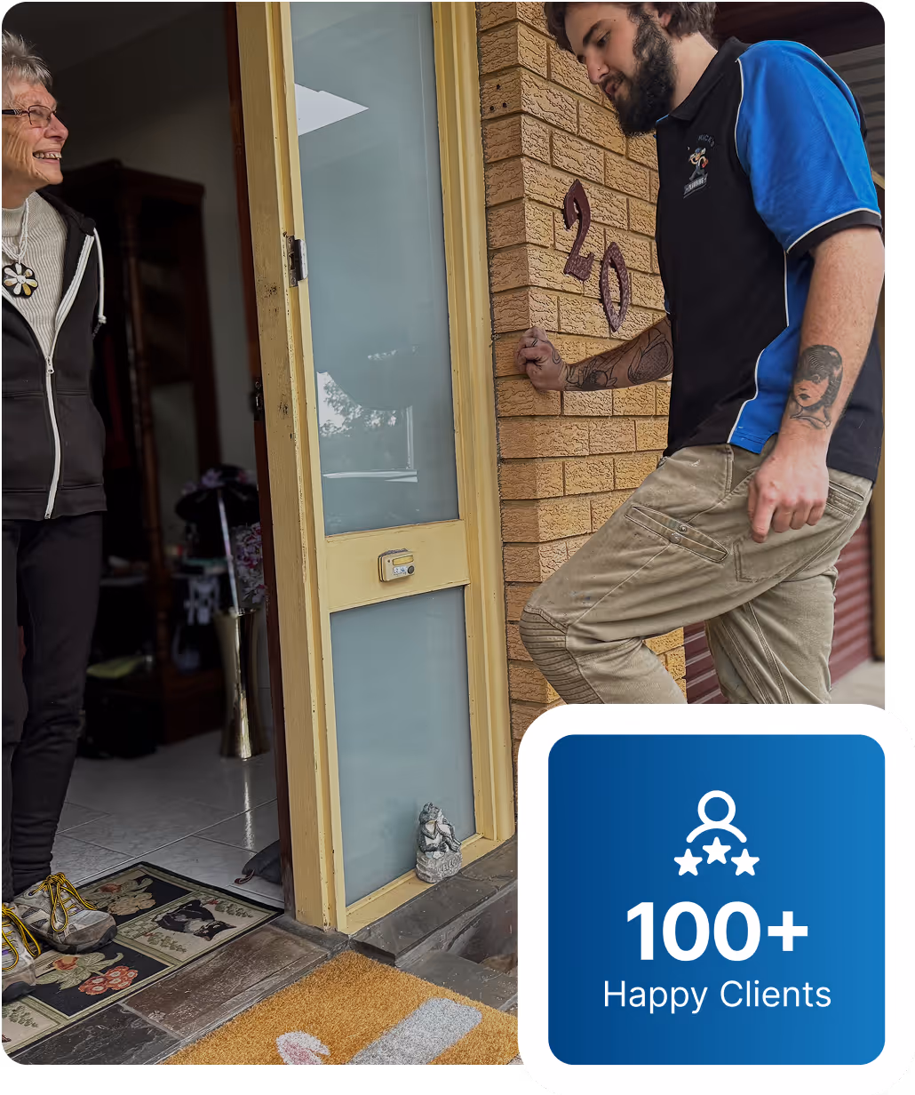 Local St Marys plumber discussing plumbing quote with homeowner at their home.